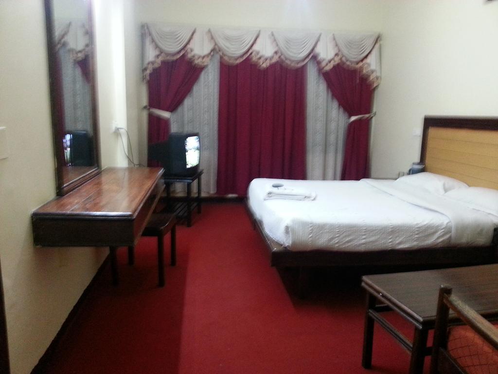 Hotel Preethi Palace Ooty Quarto foto